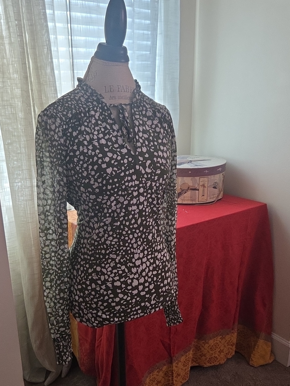Elegant Black and White Patterned Blouse